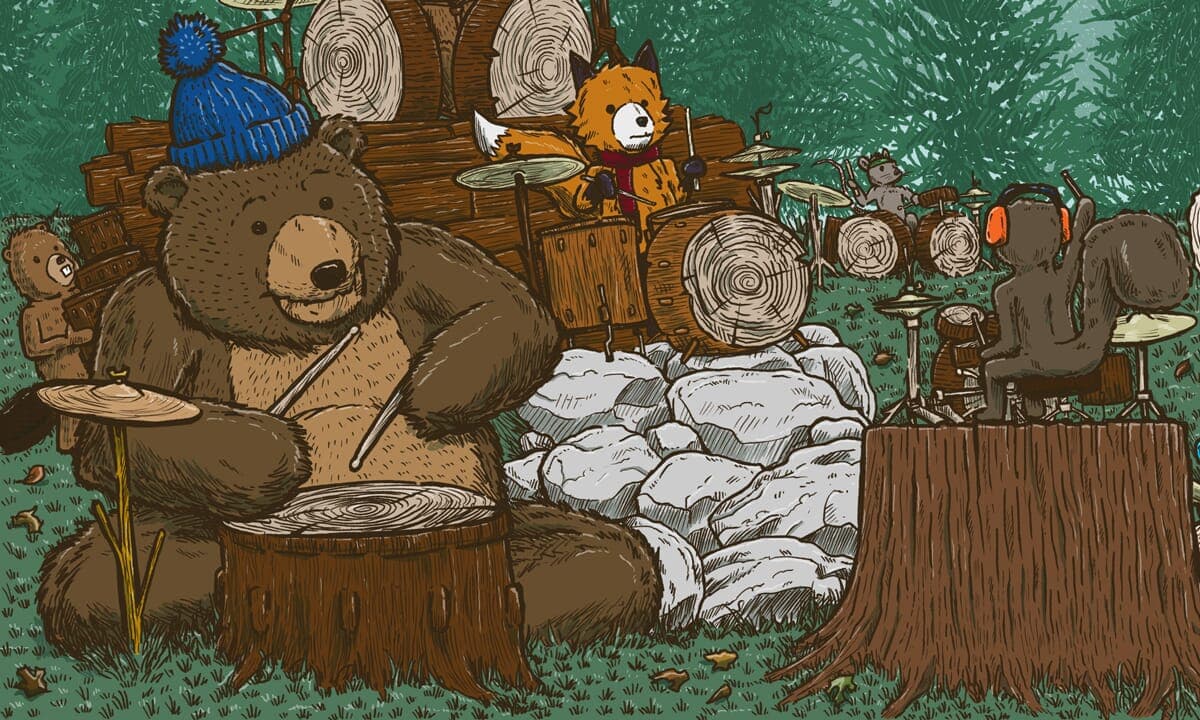 Detail of a bear with a stocking cap playing drums.