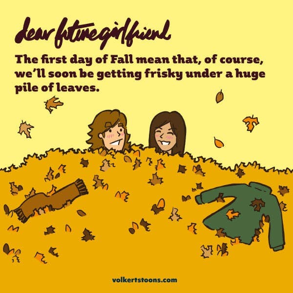 A couple gets frisky under a large pile of leaves.