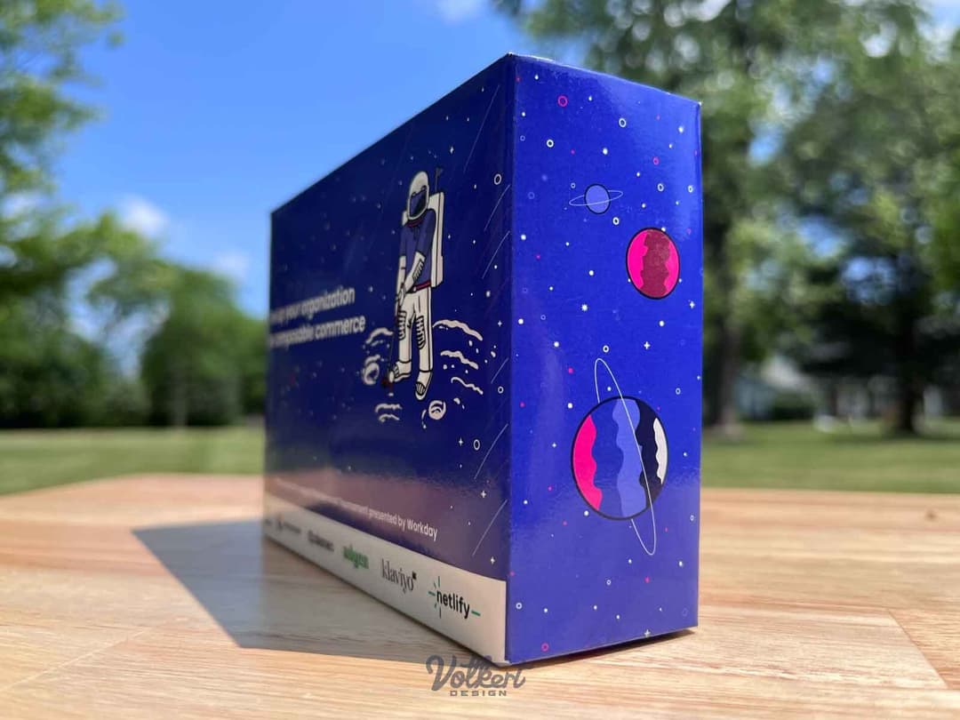 A variety of alien planets on the smaller box edge of the promotional golf ball box.