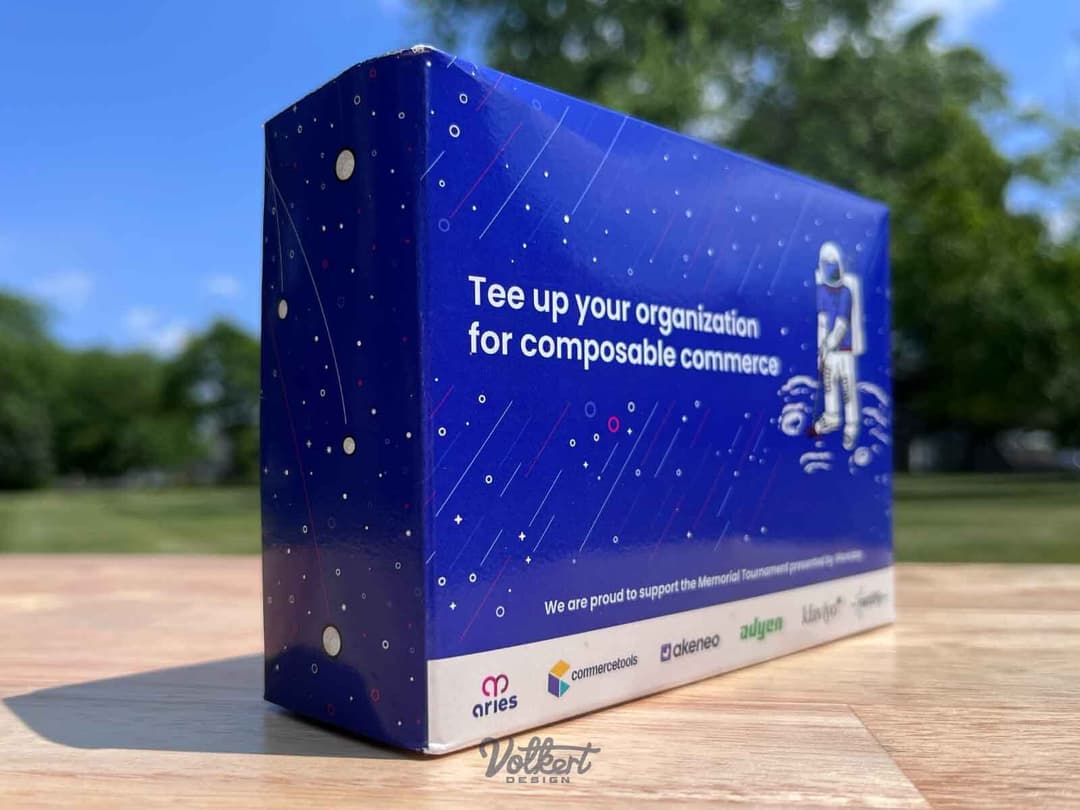 Four tiny white golf balls being shot into the vacuum of space.