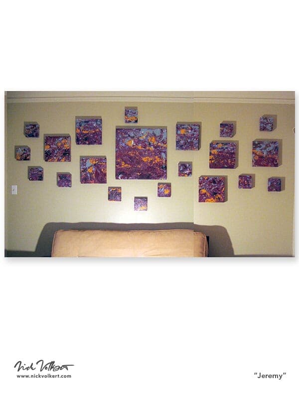 A series of various sized panels represented as one piece with a dark purple color and hints of orange, blue and white.