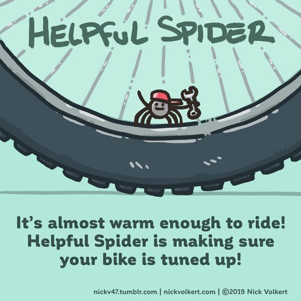 Helpful Spider is on a bike tire holding a wrench.