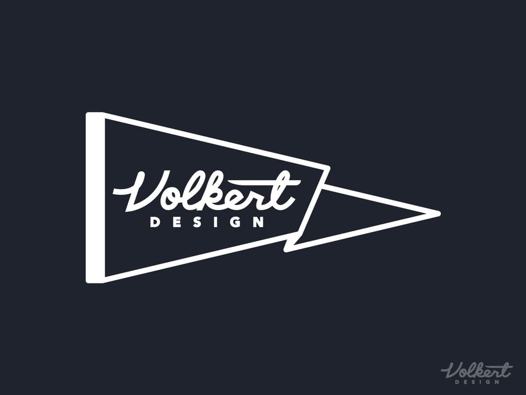 Volkert Design script in a waving gray pennant.