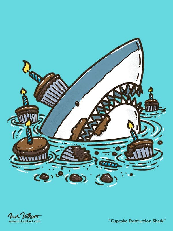 A shark in water surrounded by chocolate cupcakes.