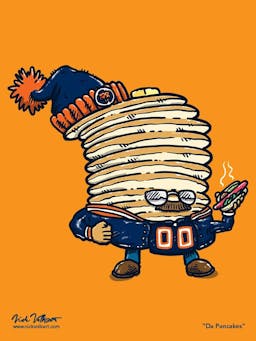 Captain Pancake is dressed like a Chicago Bears Superfan, and is holding a chicago-style hot dog.