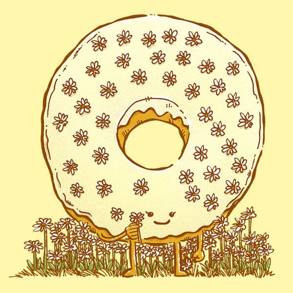 A yellow iced donut with sugary flower for decorations in Spring with a little daisy in it's hands!