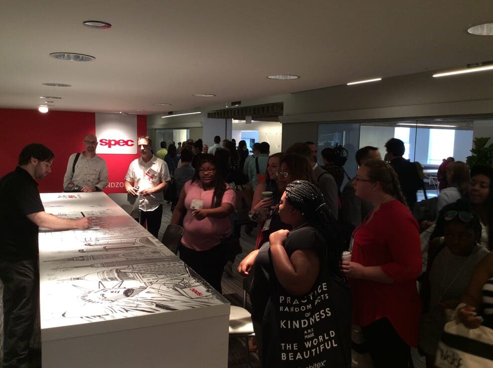 Onlookers during process of Spec Furniture in the Merchandise Mart